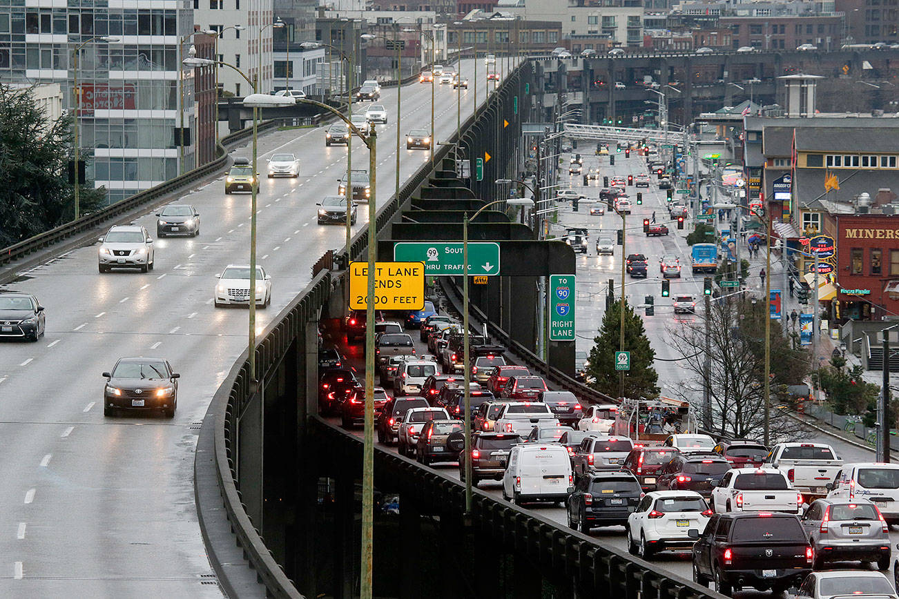 Southbound traffic backs up as northbound drivers cruise on with ease on the State Route 99 viaduct three days before its closure. (Andy Bronson / Herald file)