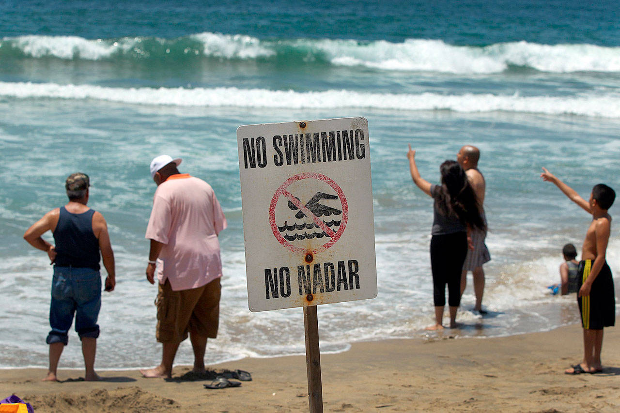 The waters off Manhattan Beach, California, were closed to swimmers on July 5, 2014, after a swimmer was bitten by a shark. (Rick Loomis/Los Angeles Times/MCT)