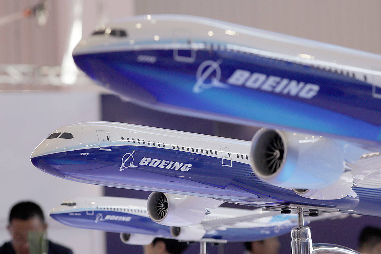 Models of a Boeing passenger planes on display during the 12th China International Aviation and Aerospace Exhibition last year in Zhuhai city. (AP Photo/Kin Cheung, File)