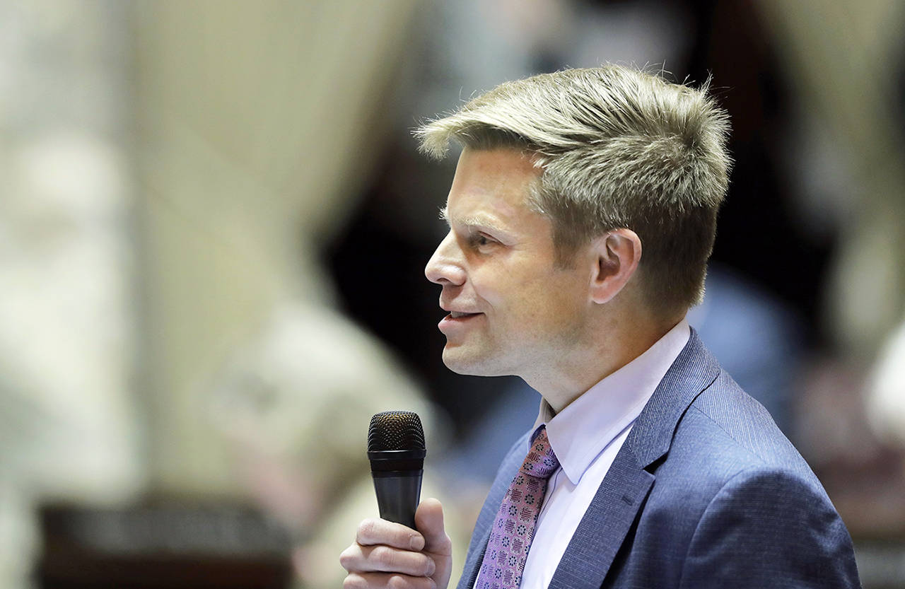 Sen. Jamie Pedersen, D-Seattle, speaks on the Senate floor in Olympia on Wednesday. Pedersen introduced a bill that he says moves the Legislature toward more transparency — but within limits. (AP Photo/Ted S. Warren)