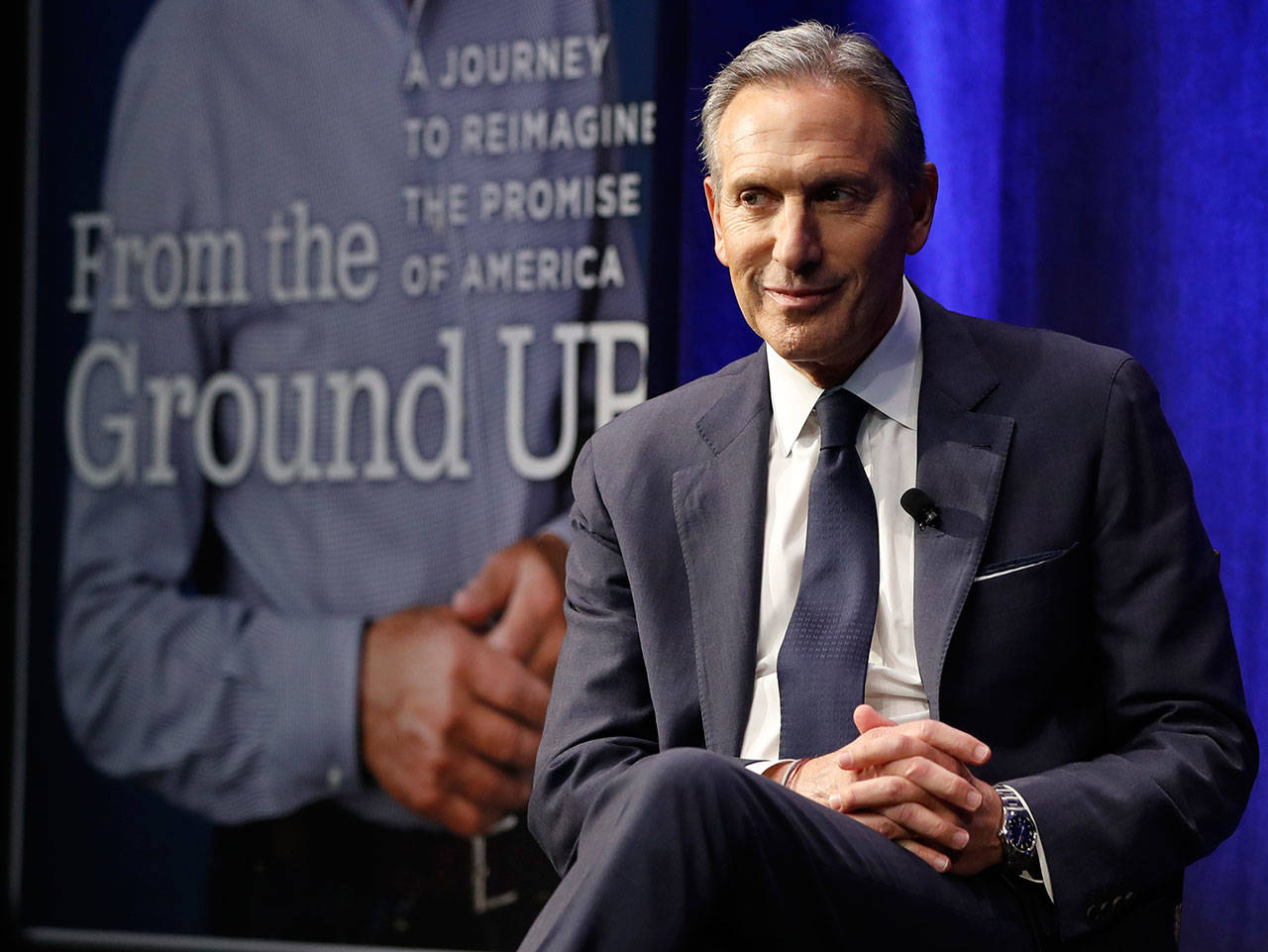 Former Starbucks CEO and Seattle Sonics owner Howard Schultz looks out at the audience during a book promotion tour on Monday in New York. (AP Photo/Kathy Willens)