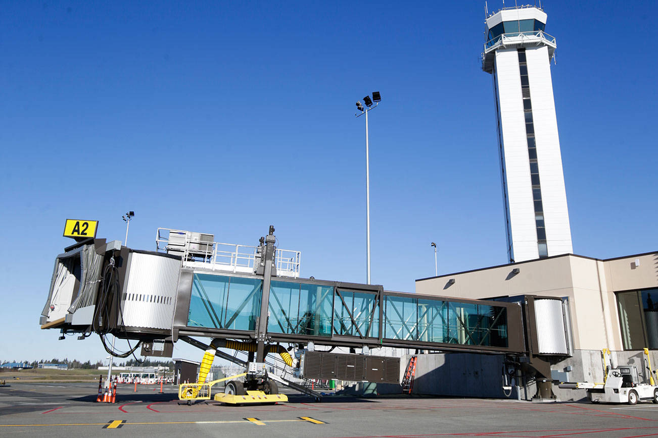 Passengers and workers await first Paine Field boarding call