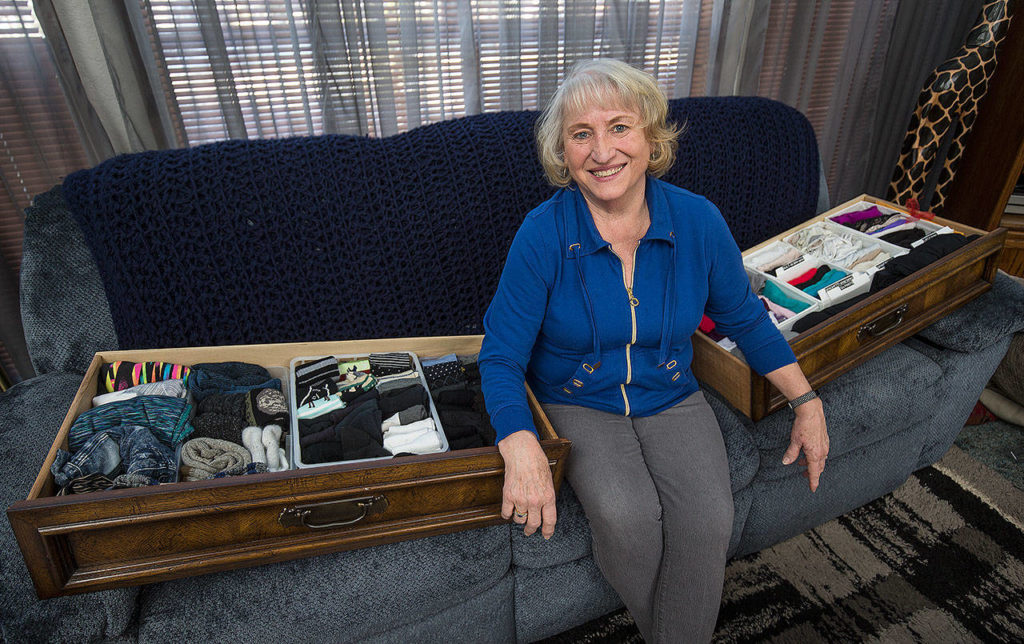 Jackie Noble,72, has organized her dresser clothes using the Marie Kondo method, to the point of labeling the items. (Andy Bronson / The Herald)
