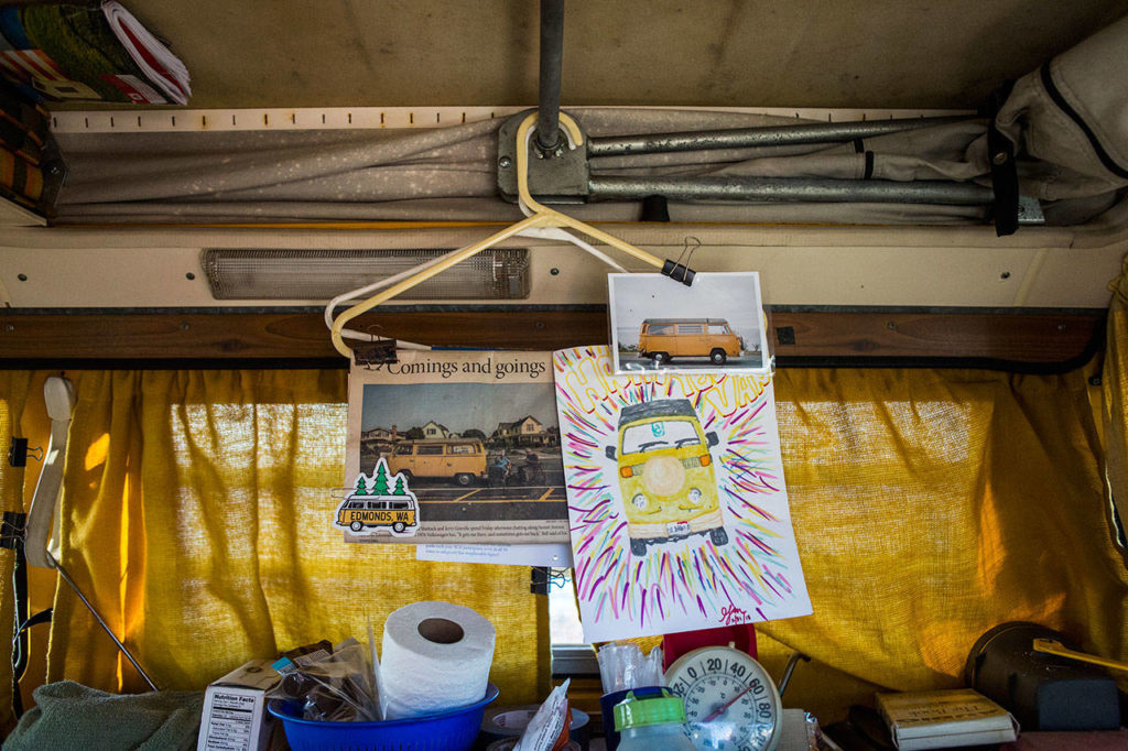 Photos and drawings given to Steve Bell hang in his Volkswagen Westfalia van. (Olivia Vanni / The Herald)
