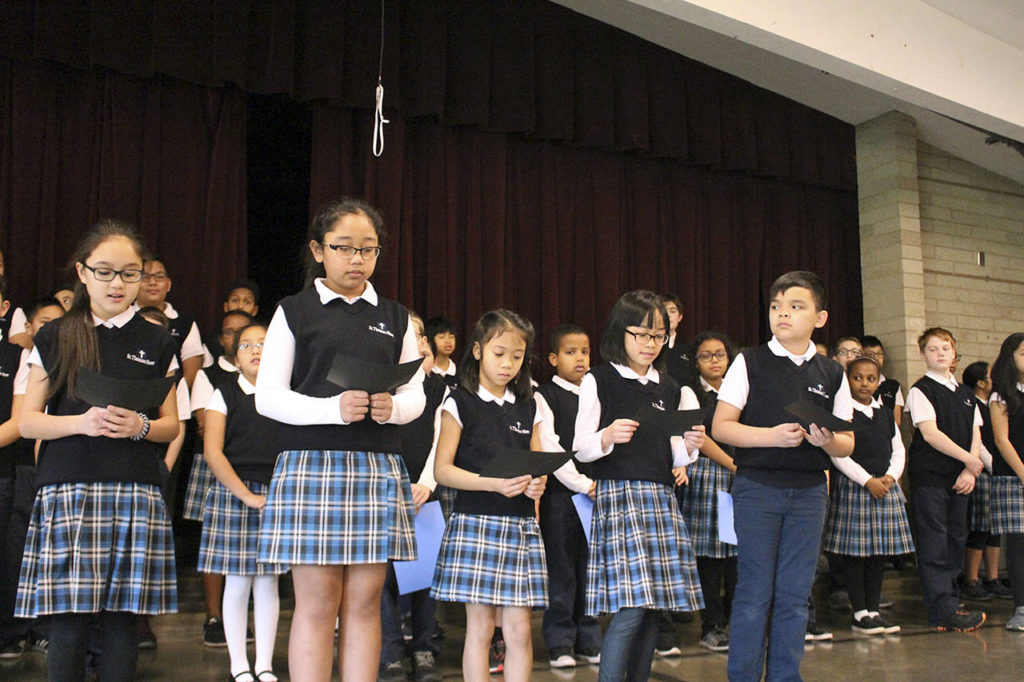 Submitted photo
Fourth, fifth and sixth-grade students at St. Thomas More Parish School recently celebrated the legacy of Dr. Martin Luther King Jr. at an assembly. Part of their message said: “Today we will gather in prayer to not only remember the sad history of slavery in our country and the fight against racism; but, to also join in prayer to ask God to bring unity and peace to our world.”
