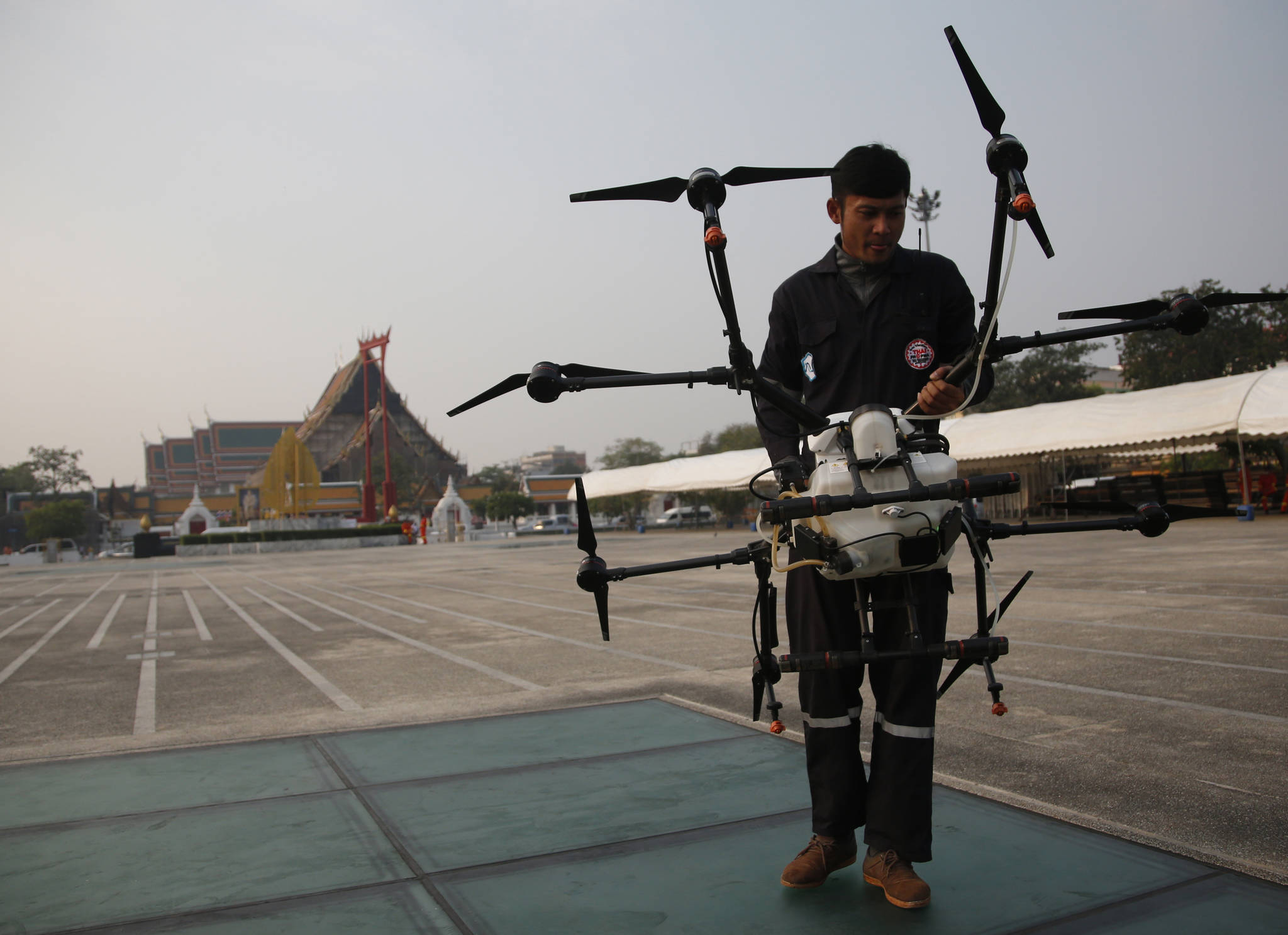 Bangkok flies drones as PM warns of costs in pollution fight