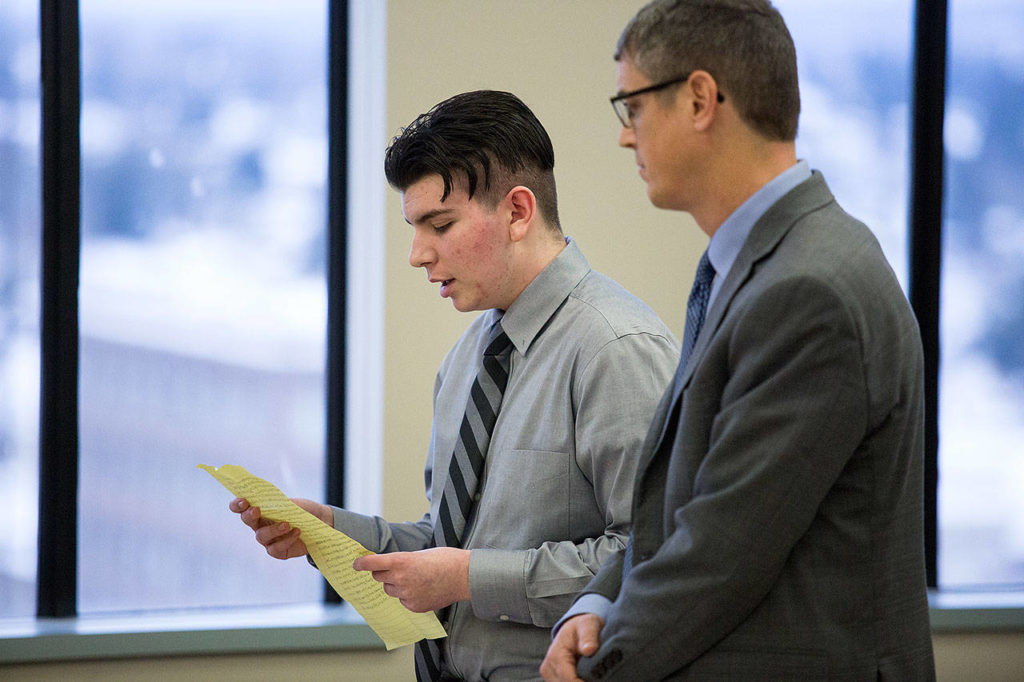 Joshua O’Connor reads a statement during his sentencing hearing in Snohomish County Superior Court in Everett on Tuesday after he pleaded guilty for plotting a school shooting. (Andy Bronson / The Herald) 
