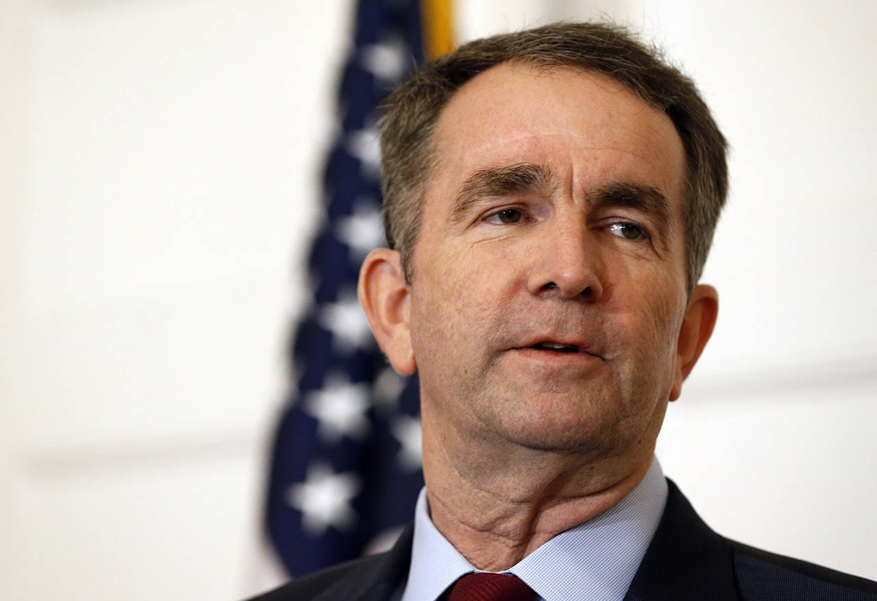 FILE - In this Feb. 2, 2019 file photo, Virginia Gov. Ralph Northam speaks during a news conference in the Governor’s Mansion in Richmond, Va. Northam clung to his office Tuesday, Feb. 5, amid intense political fallout over a racist photo in his 1984 medical school yearbook and uncertainty about the future of the state’s government. (AP Photo/Steve Helber, File)