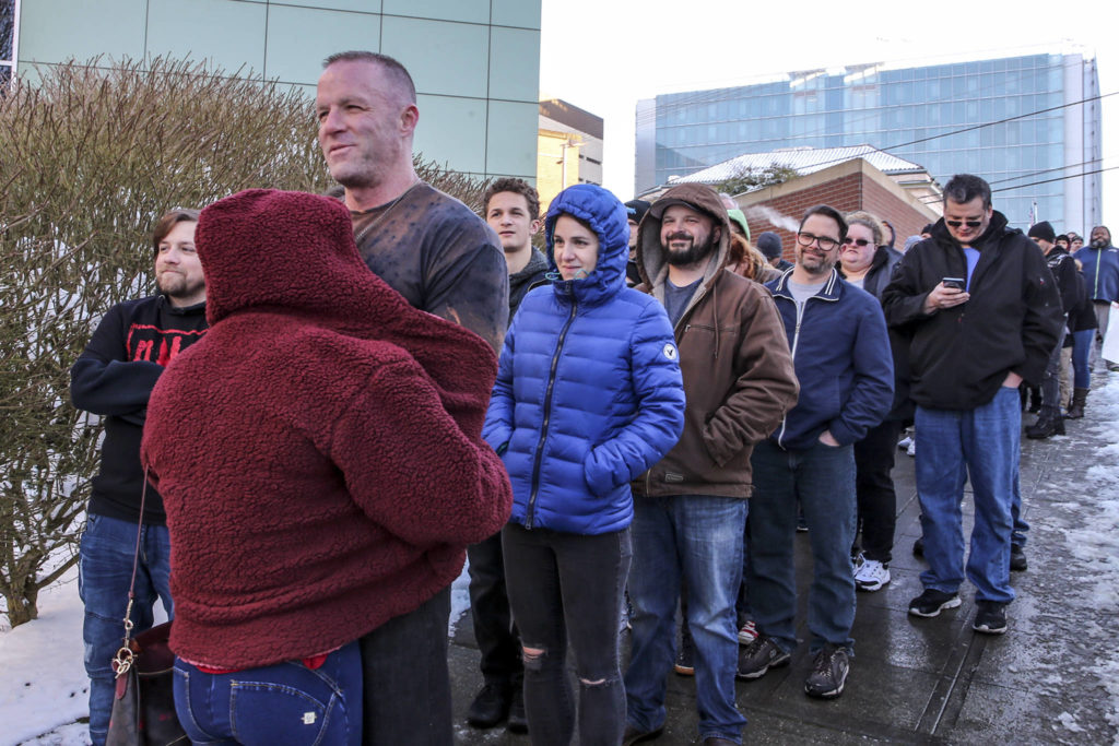 Braving freezing temperatures, fans line up for the WWE Smackdown Live event Tuesday at Angel of the Winds Arena in Everett. (Kevin Clark / The Herald)
