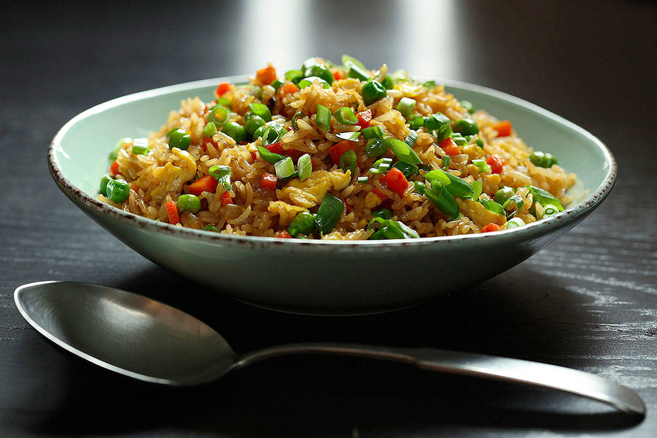 Leftover Chinese food from a Christmas feast inspired food writer James P. DeWan to teach readers how to make crave-worthy fried rice. (Abel Uribe / Chicago Tribune)