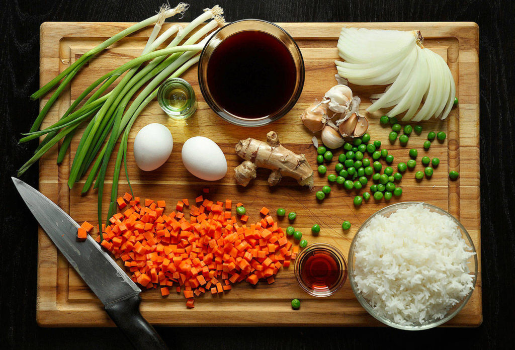 Cooks can switch up the flavors of their fried rice by combining the flavor profiles suggested below with the general cooking principles outlined in the basic recipe above. (Abel Uribe / Chicago Tribune)
