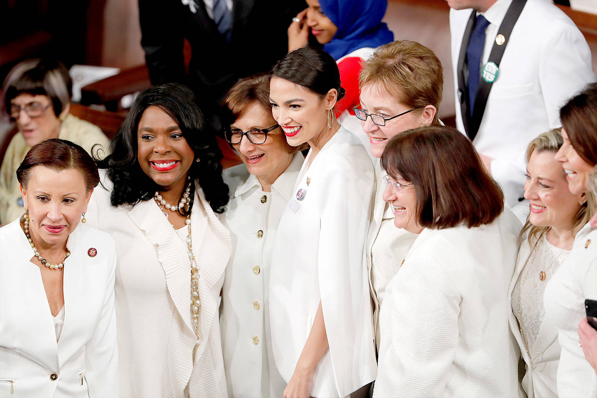 Democratic members of Congress, including Rep. Alexandria Ocasio-Cortez (center), D-N.Y., pose for a photo before President Donald Trump delivers his State of the Union address to a joint session of Congress on Capitol Hill in Washington on Tuesday. (AP Photo/J. Scott Applewhite)