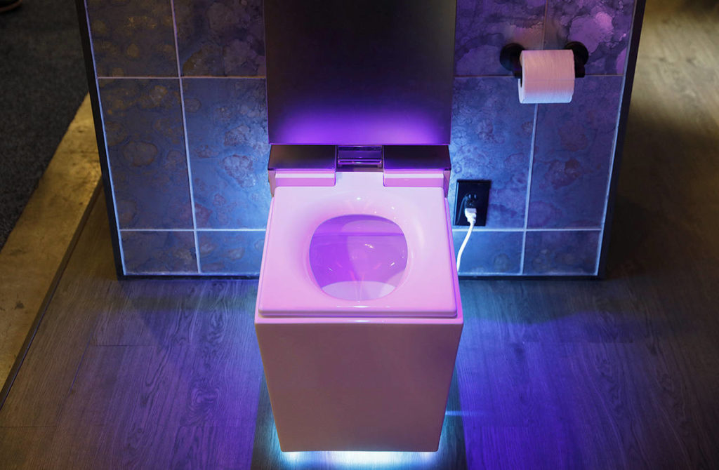 The Numi 2.0 intelligent toilet with Amazon Alexa is on display at the Kohler booth at CES International on Wednesday in Las Vegas. (AP Photo/John Locher)
