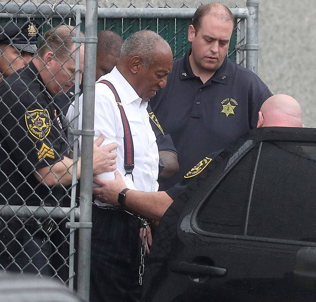 Entertainer Bill Cosby is escorted out in shackles from the Montgomery County courthouse in Norristown, Pa. on Sept. 25, 2018. Cosby was sentenced to three to 10 years in prison. (David Maialetti/Philadelphia Inquirer/TNS)