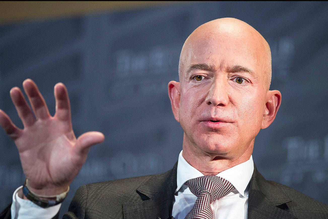 Bezos tells of Enquirer threats to publish revealing pics