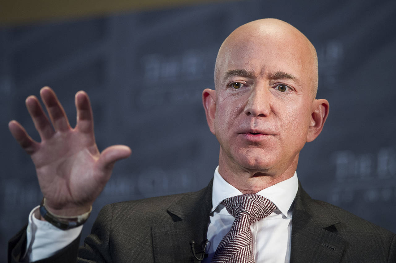 Jeff Bezos, Amazon founder and CEO, ssays the National Enquirer is threatening to publish nude photographs of him unless his private investigators back off the tabloid that detailed the billionaire’s extramarital affair. (AP Photo/Cliff Owen, File)