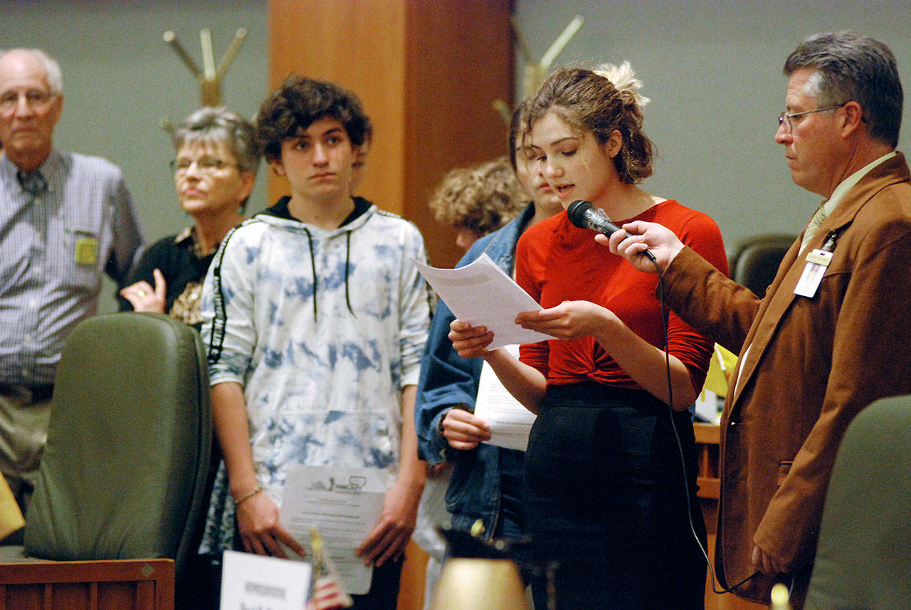 High school student Sophia Lussiez, 17, testifies Feb. 4 in support of proposals for new gun safety regulations in the state, in Santa Fe, New Mexico. The New Mexico Legislature is considering a bill that would temporarily restrict firearms access for people considered to be at risk to themselves or others. Various states are considering similar regulations since last year’s mass shooting at a Florida high school. (AP Photo/Morgan Lee)
