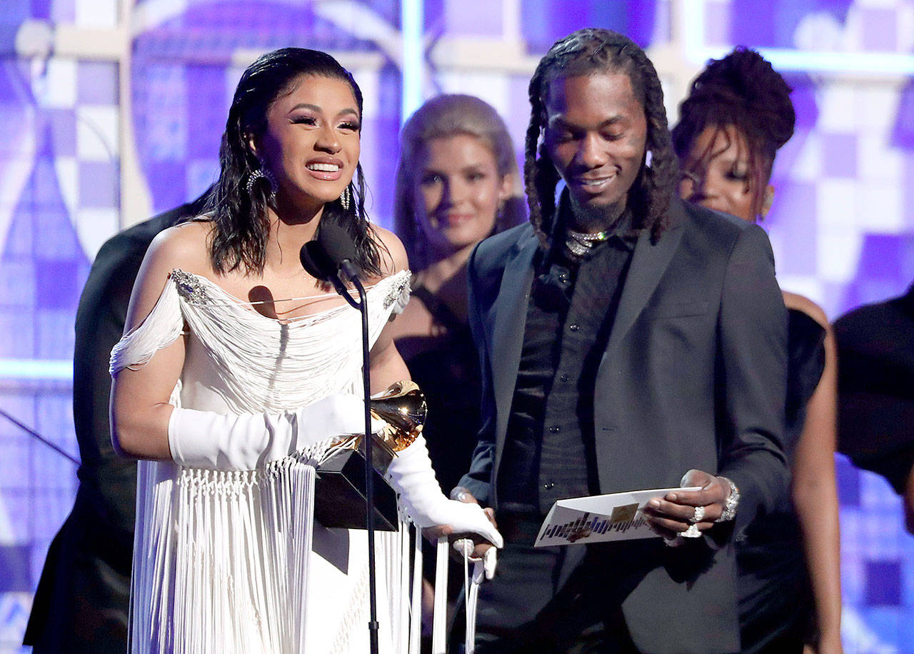 Cardi B (left) accepts the award for best rap album for “Invasion of Privacy” as Offset looks on at the 61st annual Grammy Awards on Sunday in Los Angeles. (Matt Sayles/Invision/AP)