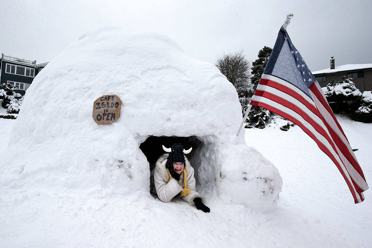 Another storm brings crashes, mounds of trash and an igloo