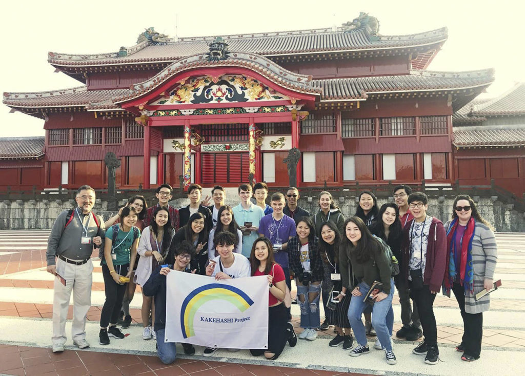 Kamiak High School students and teachers pose at the entrance to Shuri Castle in Naha, Japan. (Submitted photo)

