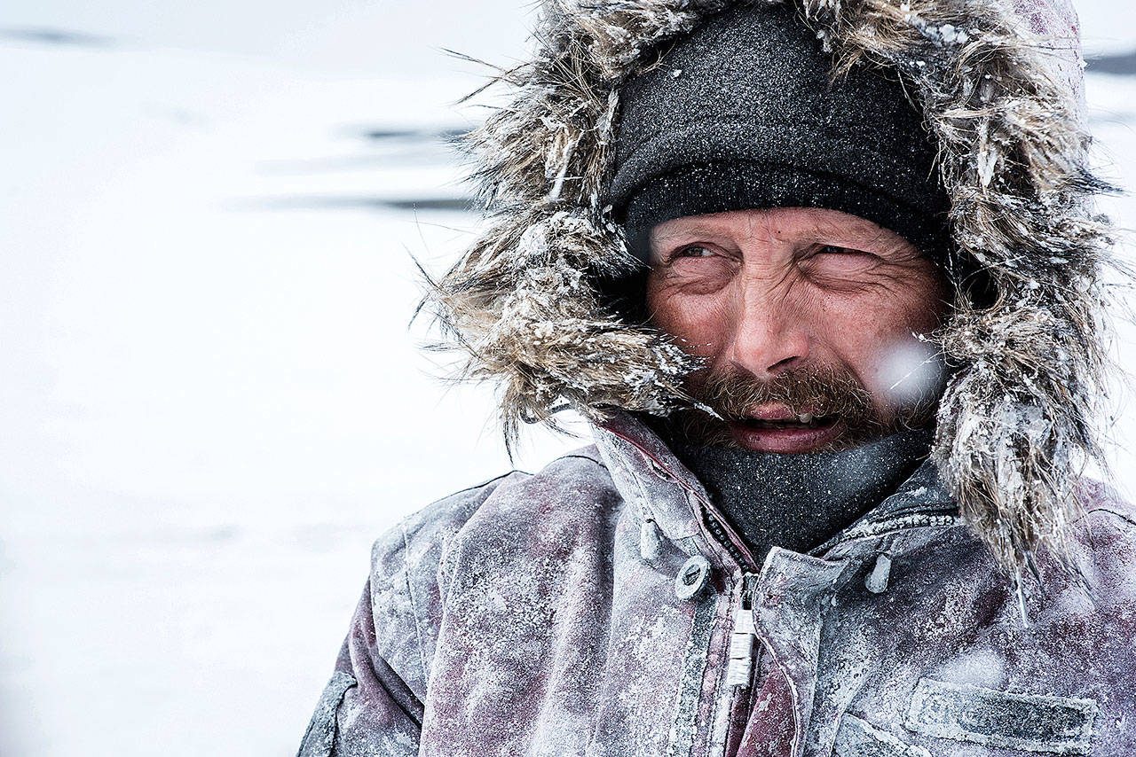 Mads Mikkelsen stars as a pilot who is stranded when his plane crashes in “Arctic.” (Bleecker Street)
