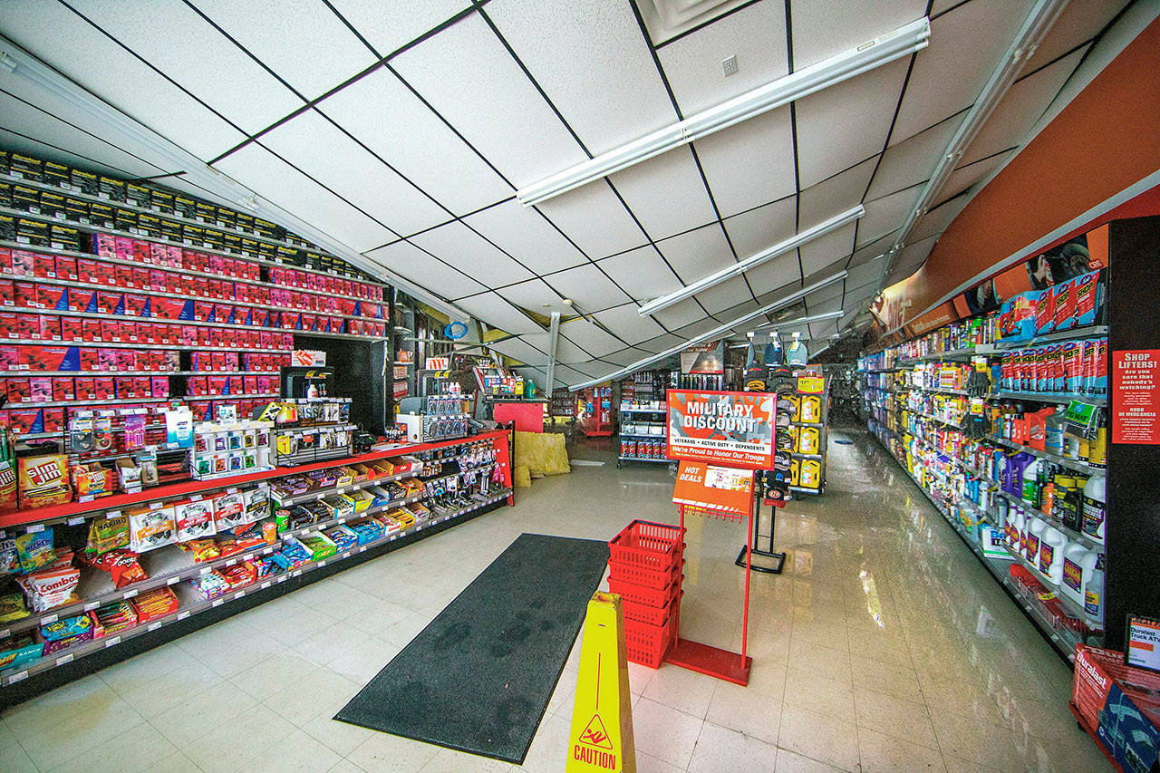 The interior of AutoZone on Evergreen Way in Everett is shown Wednesday after its roof collapsed Tuesday night. (Mike Siegel/The Seattle Times via AP)