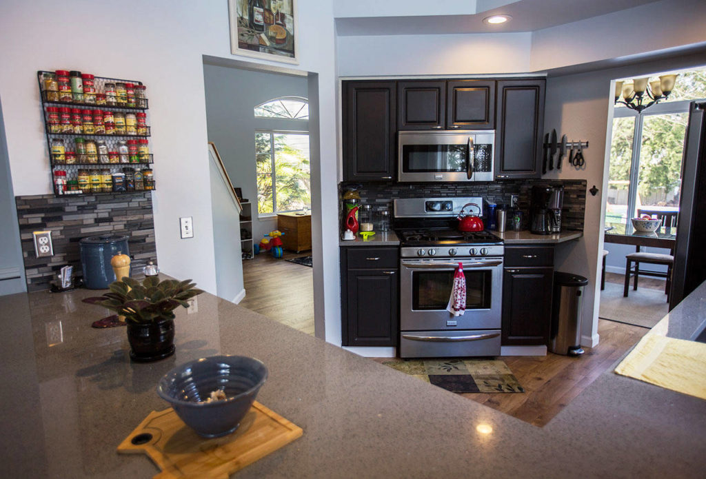 Hebert and Rohrer’s kitchen, one of their favorite spaces in their new home, features new appliances and an open concept. (Olivia Vanni / The Herald)
