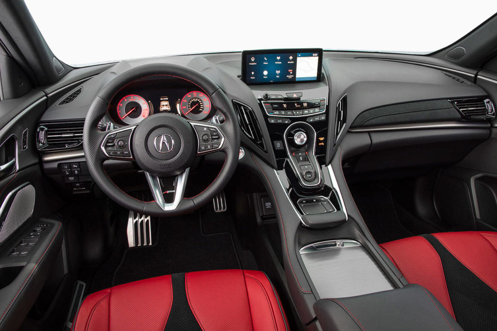 A high-deck “floating” center console is among the features contributing to the cockpit-like cabin of the all-new Acura RDX premium compact SUV. (Manufacturer photo)
