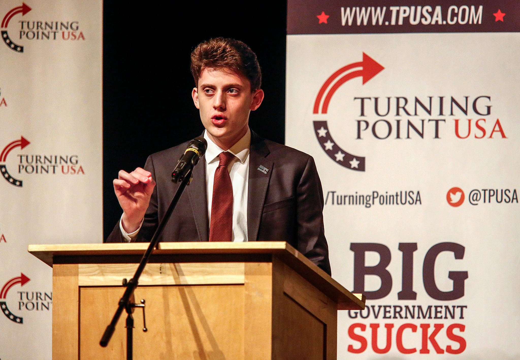 Marjory Stoneman Douglas High School student Kyle Kashuv speaks to an audience at Jackson High School on Wednesday night about gun control and school shootings. Kashuv is a gun-rights advocate and survivor of a Florida school shooting in 2018. (Dan Bates / The Herald)