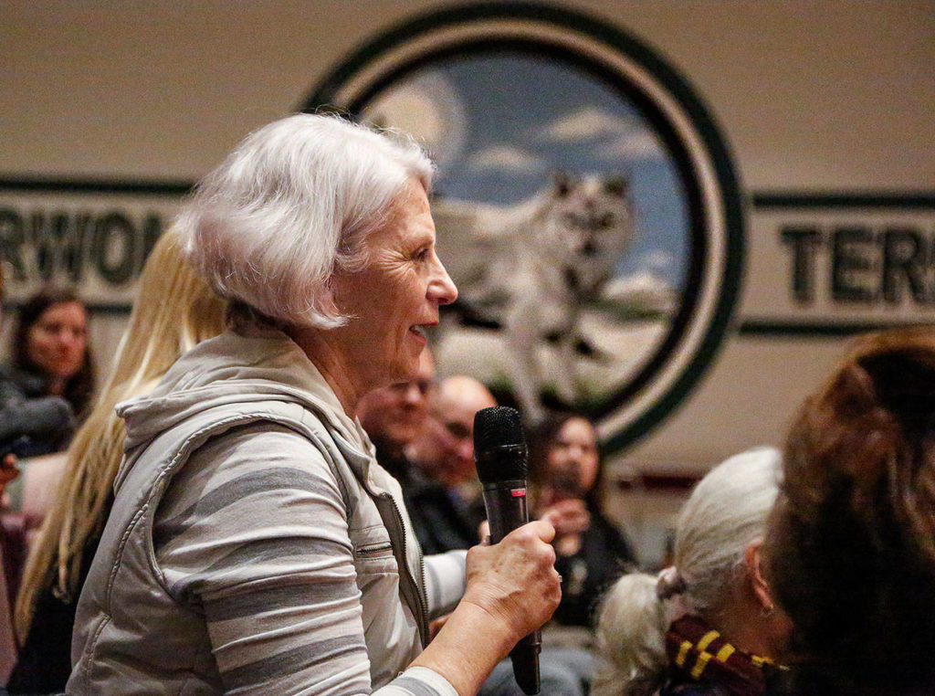 Debbie Blodgett, chairwoman Snohomish County Republicans, directs her questions to Kyle Kashuv on Wednesday night. (Dan Bates / The Herald)
