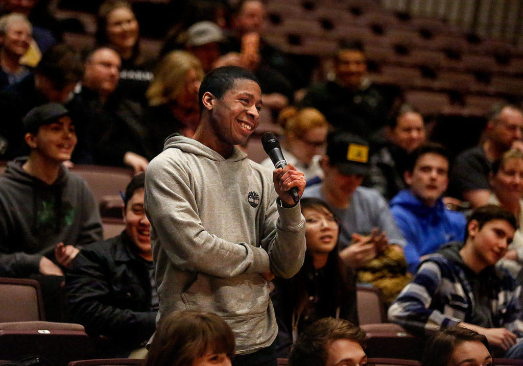 Jackson senior Silas Simpson, a conservative who said he moved here from Texas, asked the speaker if he would allow kids to come up after the talk for a picture with him. Answer: “Yes.” (Dan Bates / The Herald)
