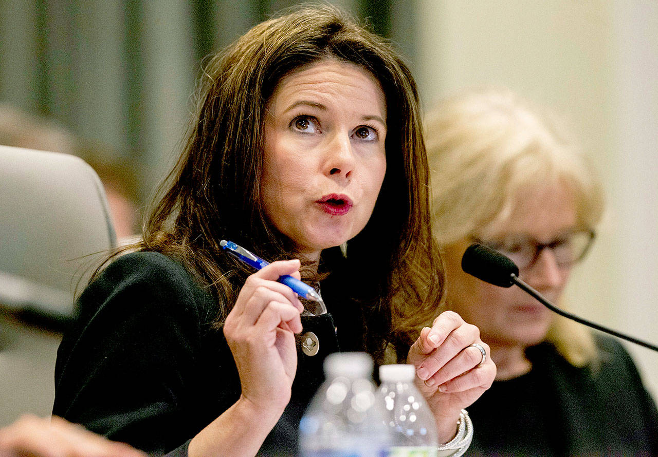 Kim Westbrook Strach, executive director of the Bipartisan State Board of Elections & Ethics Enforcement, questions a witness during the second day of a public evidentiary hearing on the 9th congressional district voting irregularities investigation Tuesday in Raleigh, North Carolina. (Travis Long/The News & Observer via AP, Pool)