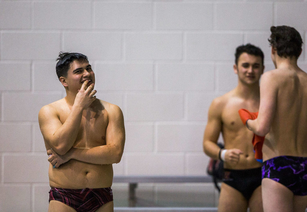 Cascade’s Joseph Hofman reacts to his dive score during the Mens 1 Meter Diving at the 4A Boys’ Swim/Dive Championships on Saturday, Feb. 16, 2019 in Federal Way, Wash. (Olivia Vanni / The Herald)
