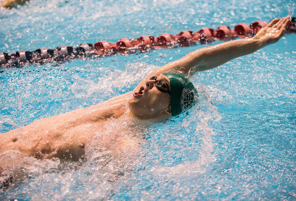 Shorecrest’s Aric Prieve competes in the 100 Yard Backstroke during the 3A Boys’ Swim/Dive Championships on Saturday, Feb. 16, 2019 in Federal Way, Wash. (Olivia Vanni / The Herald)
