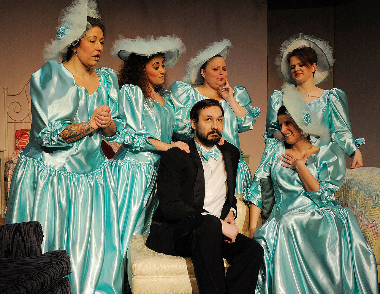 Wedding usher Tripp played by Ben St. Hilaire attracts the attention of five bridesmaids — from left, Codie Wyatt, Jeryn Pasha, Rita Baxter, Bethany Roddy, Lydia O’Day — in “Five Women Wearing the Same Dress.” (Larry T. Lisk)
