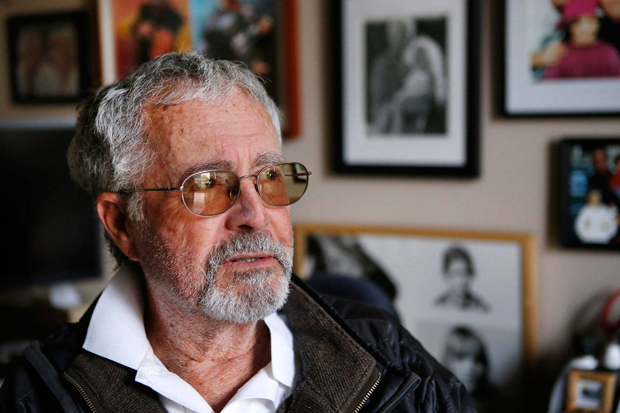 Guy Webster talks in his office surrounded by family photographs hanging at his Ojai, California, facility in 2017. Webster was one of the entertainment industry’s most successful photographers, shooting every star and some of the most iconic album covers of the ’60s, ’70s and ’80s. Webster died Feb. 5 at the age of 79. (Al Seib/Los Angeles Times/TNS)