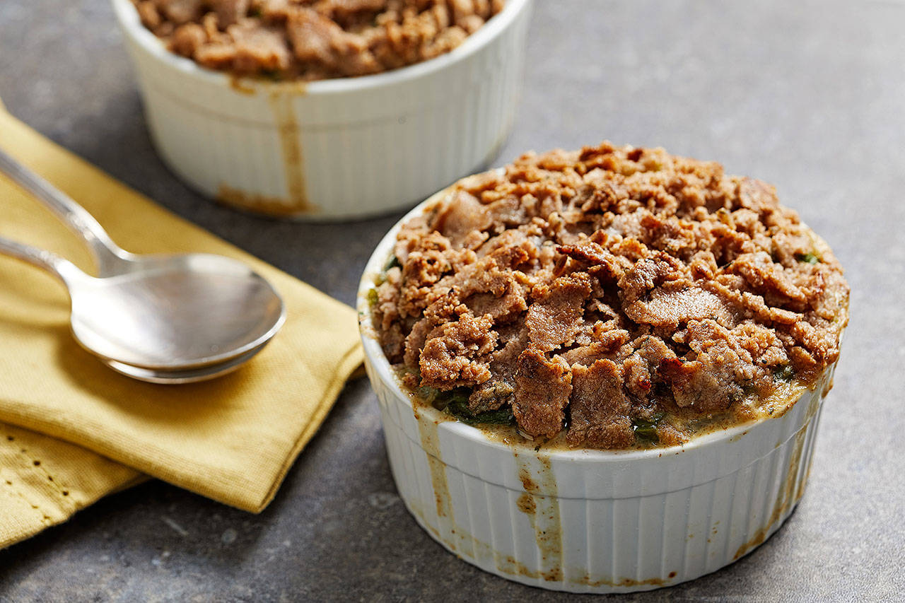 A crumble crust made of whole-grain pastry flour, olive oil and just a bit of butter turns chicken potpie into a healthful dish. (Tom McCorkle for The Washington Post)