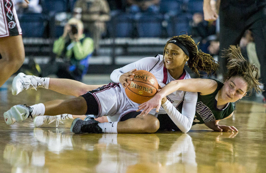 Edmonds-Woodway’s Ingrid Fosberg fights Bethel’s Sky Lett for the ball during the game against Bethel at the 3A Girls Hardwood Classic on Wednesday, Feb. 27, 2019 in Tacoma, Wash. (Olivia Vanni / The Herald)
