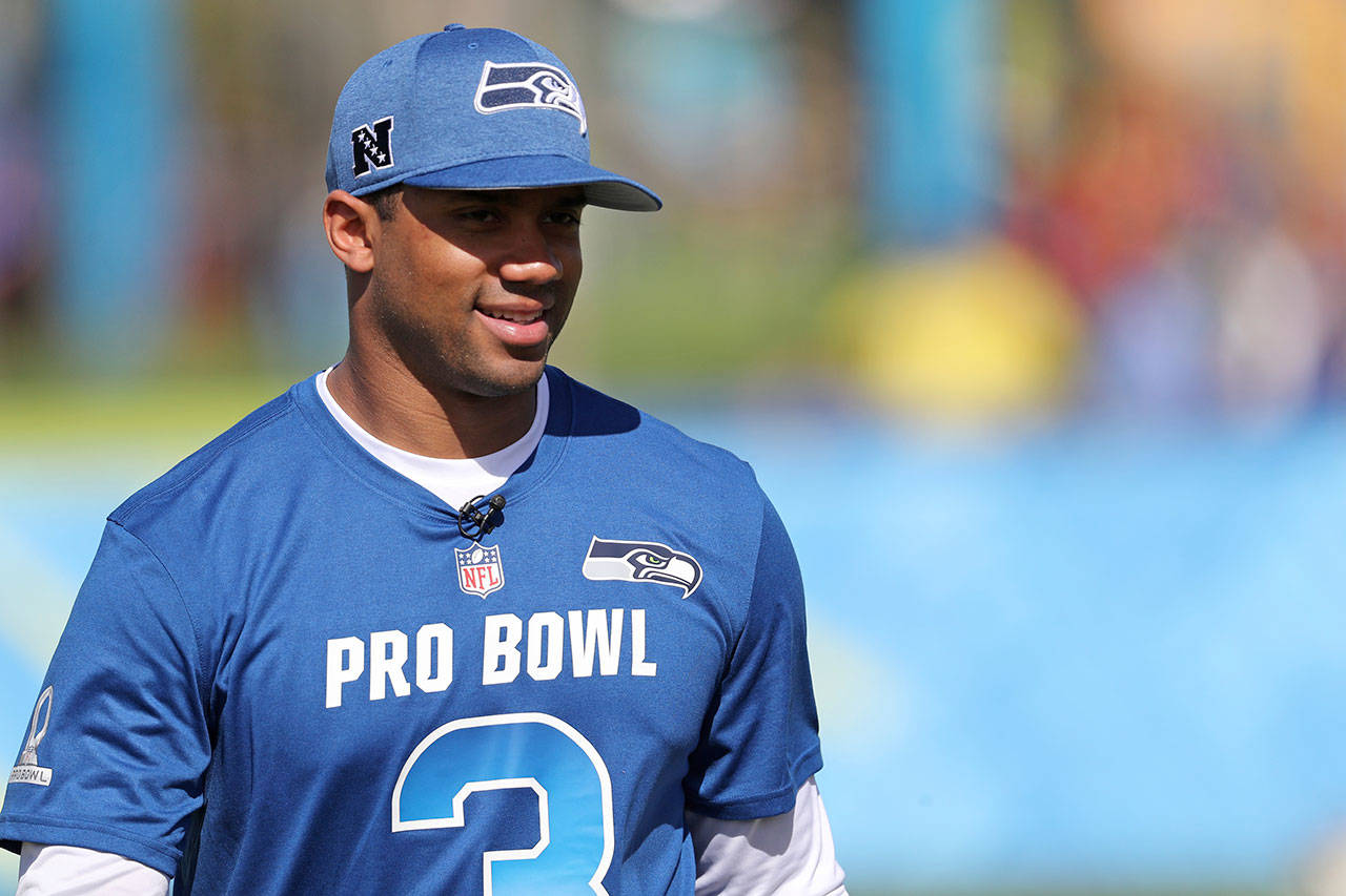 Seahawks quarterback Russell Wilson takes part in the Pro Bowl Skills Challenge on January 23, 2019, in Kissimmee, FL. (AP Photo/Gregory Payan)