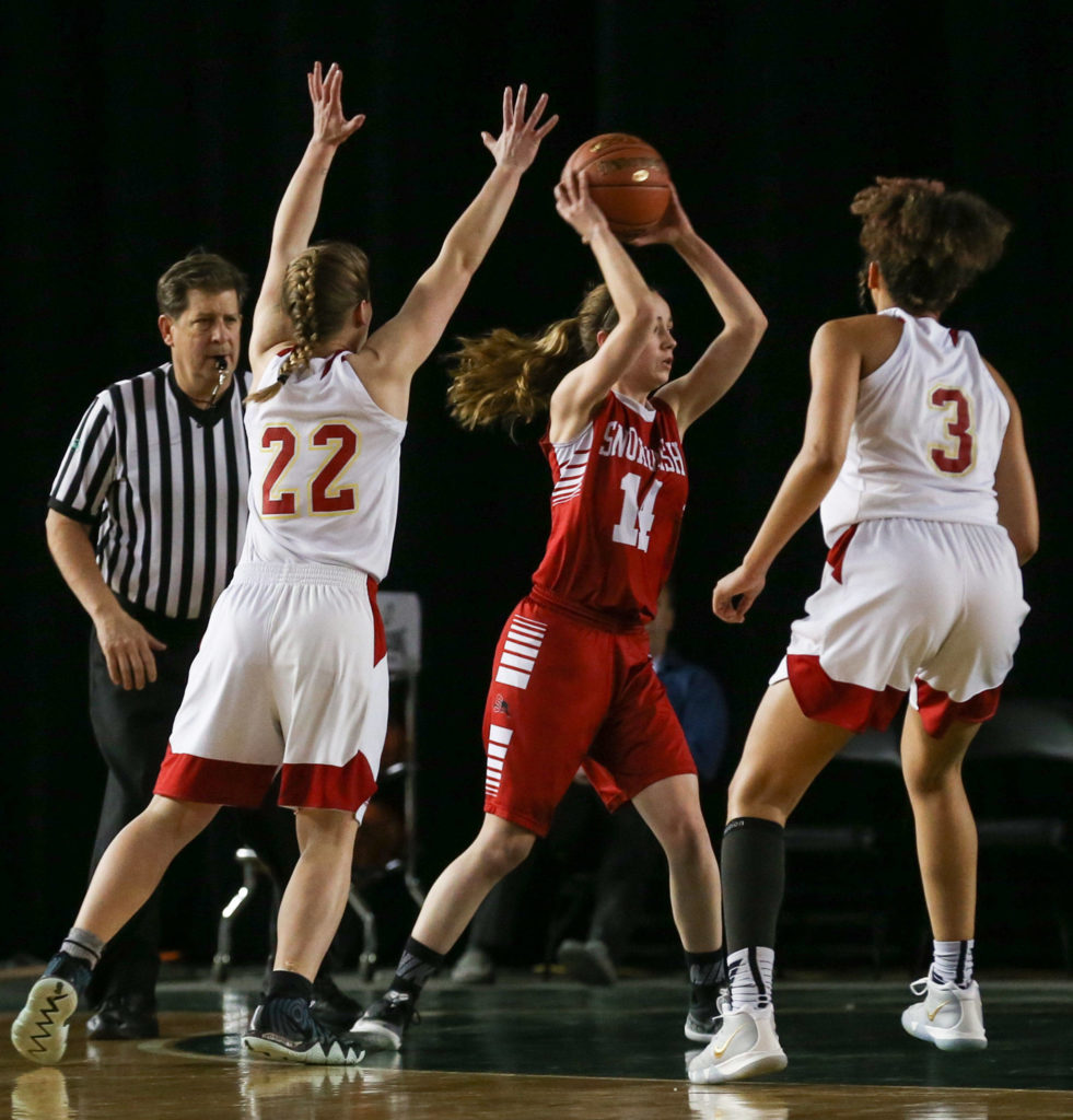 Snohomish’s Maya DuChesne look to pass with Kamiakin’s Alexa Hazel (left) and Symone Brown applying backcourt pressure Thursday morning at the Tacoma Dome on February 28, 2019. The Panthers lost 57-39.(Kevin Clark / The Herald)
