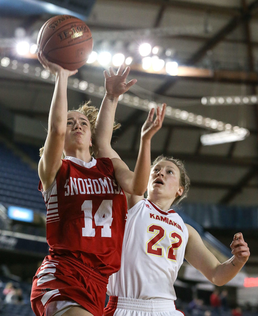 Snohomish’s Maya DuChesne attempts a shot past Kamiakin’s Alexa Hazel Thursday morning at the Tacoma Dome on February 28, 2019. The Panthers lost 57-39.(Kevin Clark / The Herald)

