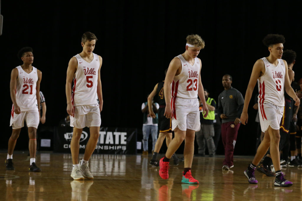 Marysville-Pilchuck walk off the court after loosing to O’Dea Thursday afternoon at the Tacoma Dome on February 28, 2019. The Tomahawks lost 63-53. (Kevin Clark / The Herald)
