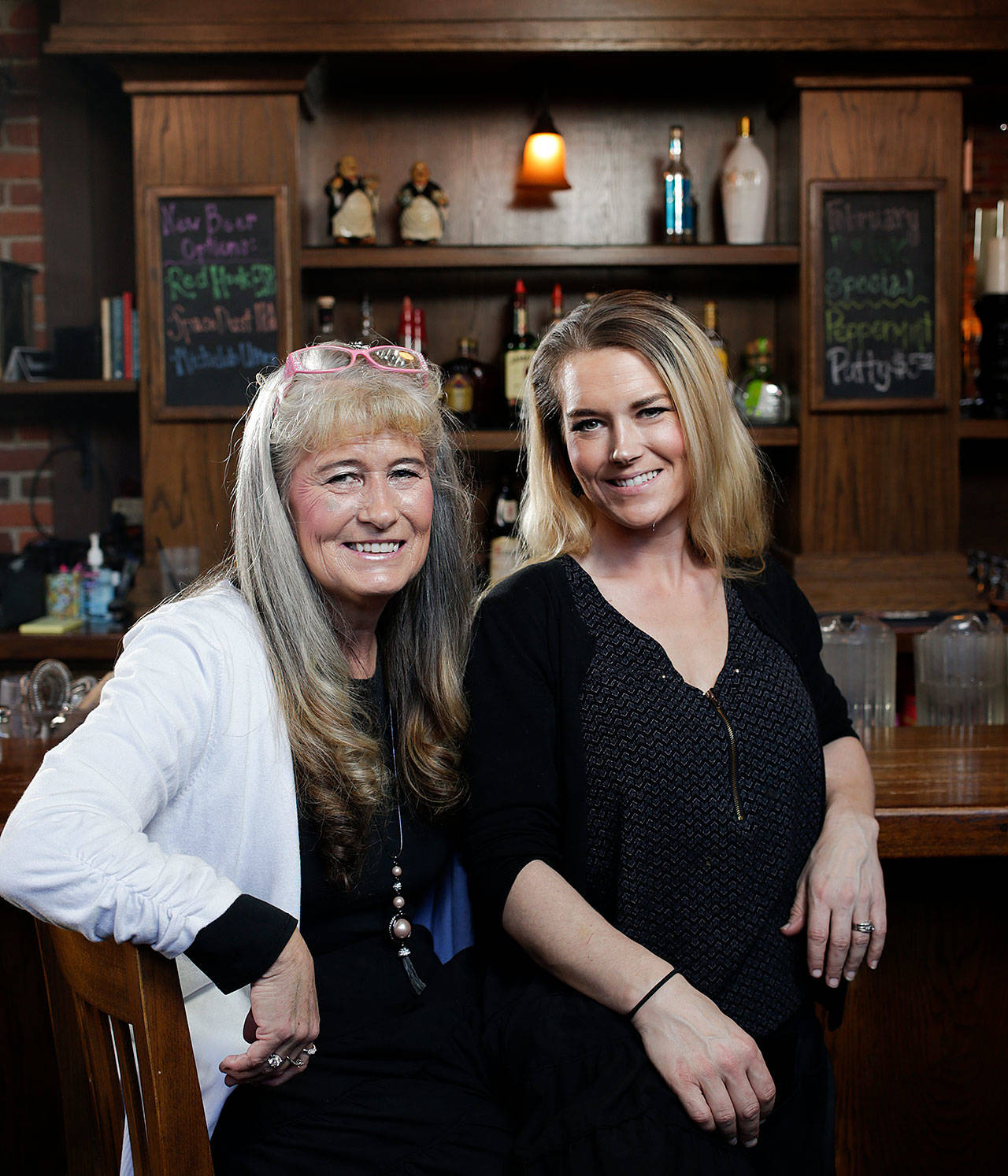This year Lorrie Bunney (left) turned over the keys to the Vintage Cafe restaurant in Everett to her daughter, Amber Lang. (Andy Bronson / The Herald)
