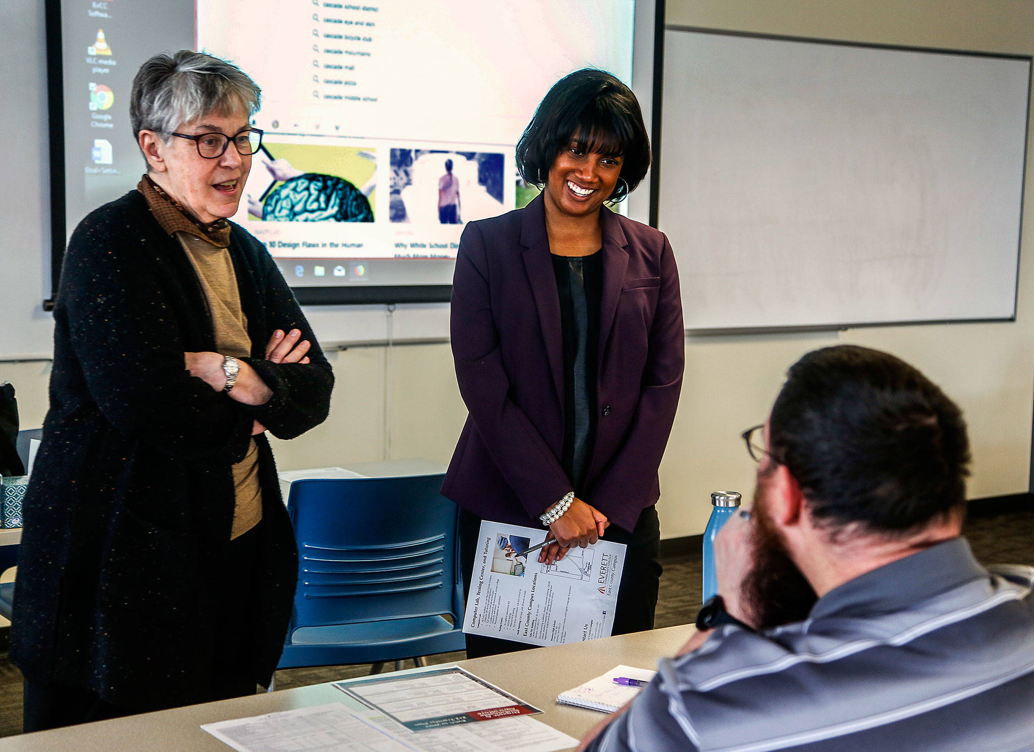 Ciera Graham (center), the new director of Everett Community College’s East County Campus in Monroe, with longtime instructor Sandy Lepper and student Leon Field (Dan Bates / The Herald)