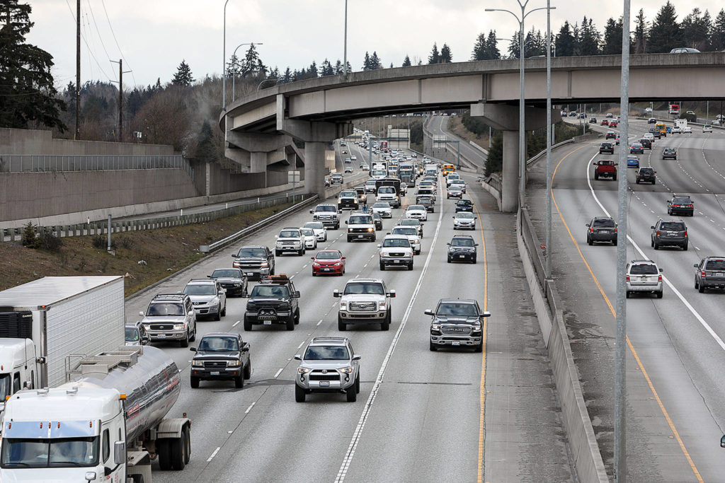 Vehicles heading north start to backup on I-5 at exit 192 as rush hour began on Thursday. (Lizz Giordano / The Herald)
