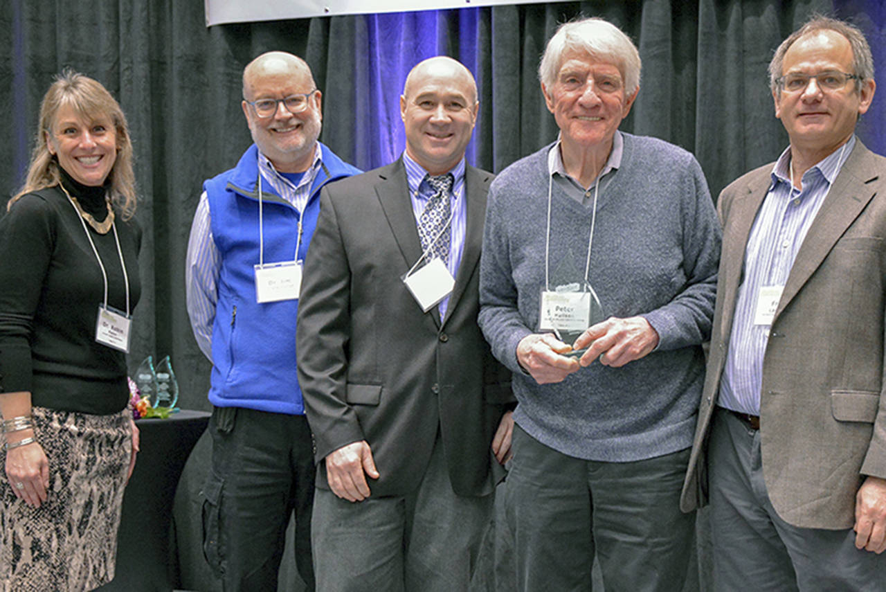 Peter Hallson (second from right) of Edmonds Bicycle Advocacy Group accepts the Outstanding Community Advocate Award from (left to right) Verdant Superintendent Dr. Robin Fenn, Commissioner Dr. Jim Distelhorst, Commissioner Fred Langer, and Commissioner Bob Knowles at the Verdant Healthier Community Conference.
