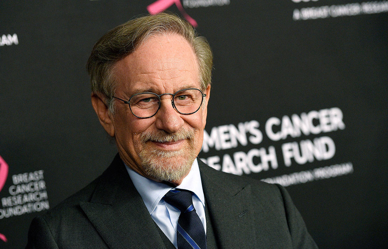 Steven Spielberg intends to support rule changes that could block Netflix from Oscars-eligibility have provoked a heated and unwieldy online debate. (Associated Press)