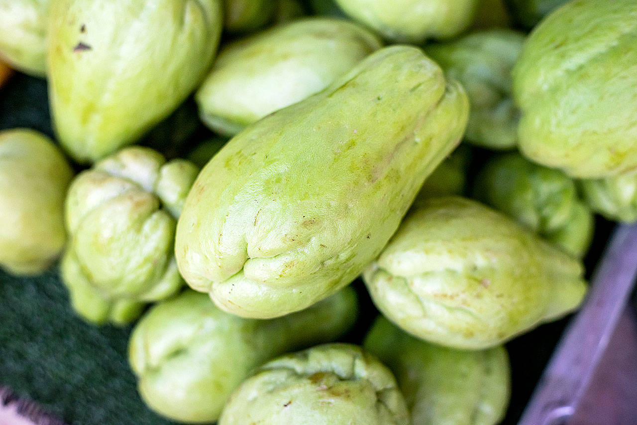 Odds are you have walked by chayote — light green and pear shaped with wrinkly ridges — while grocery shopping. (Getty Images)