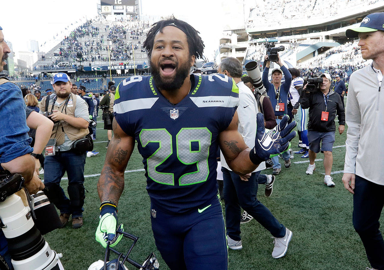 Seahawks free safety Earl Thomas reacts after the team defeated the Cowboys on Sept. 23, 2018, in Seattle. (AP Photo/Elaine Thompson)