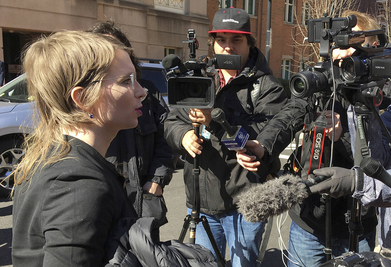 In this March 5 photo, Chelsea Manning addresses the media outside federal court in Alexandria, Virgina. The former Army intelligence analyst was ordered to jail Friday for refusing to testify to a Virginia grand jury investigating Wikileaks. (AP Photo/Matthew Barakat)